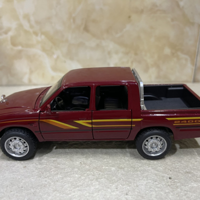 ​Mô hình xe Toyota Hilux Mughty tỷ lệ 1:32