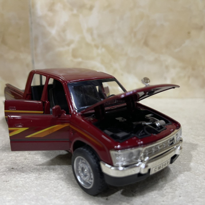 ​Mô hình xe Toyota Hilux Mughty tỷ lệ 1:32