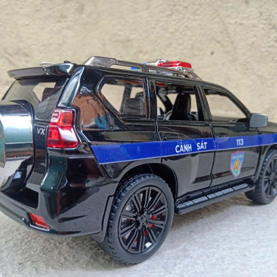 ​Mô hình xe Police Toyota Prado landCruiser CSCĐ 113 tỷ lệ1:24