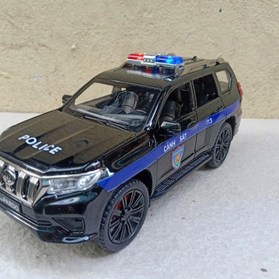 ​Mô hình xe Police Toyota Prado landCruiser CSCĐ 113 tỷ lệ1:24