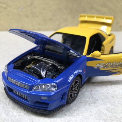 Mô hình xe NISSAN GTR R34 Sports tỷ lệ 1:32
